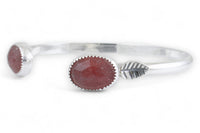Handmade sterling silver cuff with two oval pink "strawberry" quarts stones.