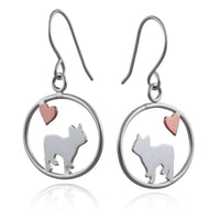 Sterling silver French Bulldog dangle earrings with copper heart inside oval frame, matte finish on white background.