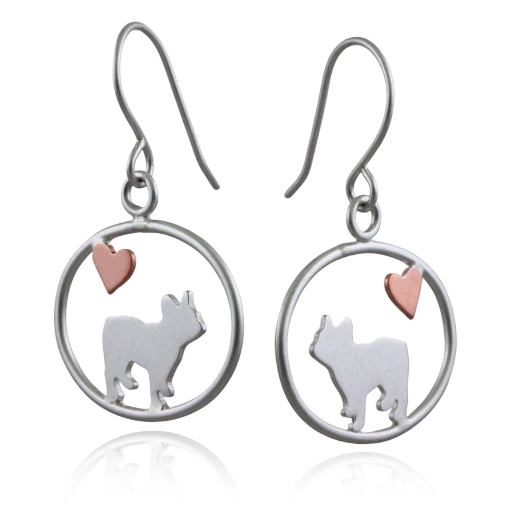 Sterling silver French Bulldog dangle earrings with copper heart inside oval frame, matte finish on white background.