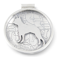 A round silver-toned metal pendant featuring a raised dog silhouette over an embossed pattern of bones, shown on a plain white background.