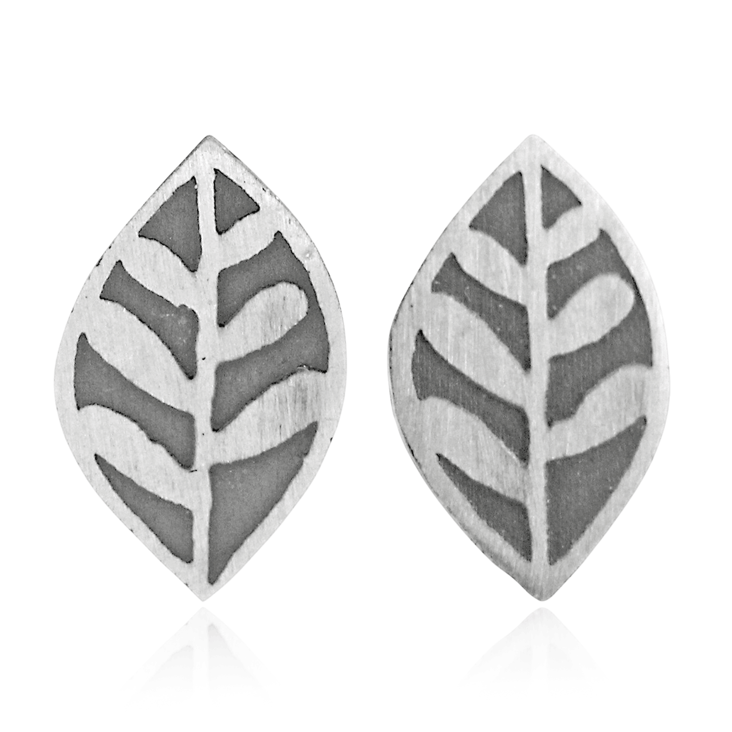 Pair of silver leaf-shaped earrings on a white background