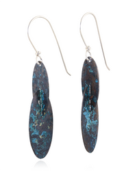 Pair of earrings with blue and gold speckled design on a white background