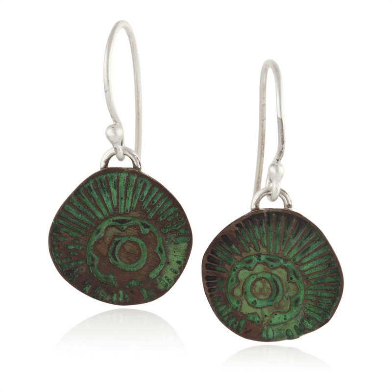 Pair of green and brown circular earrings on a white background