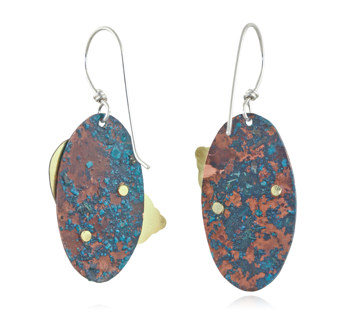 Earrings with multicolored oval designs on a white background