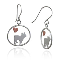 Sterling silver French Bulldog dangle earrings with copper heart inside oval frame, matte finish on white background.