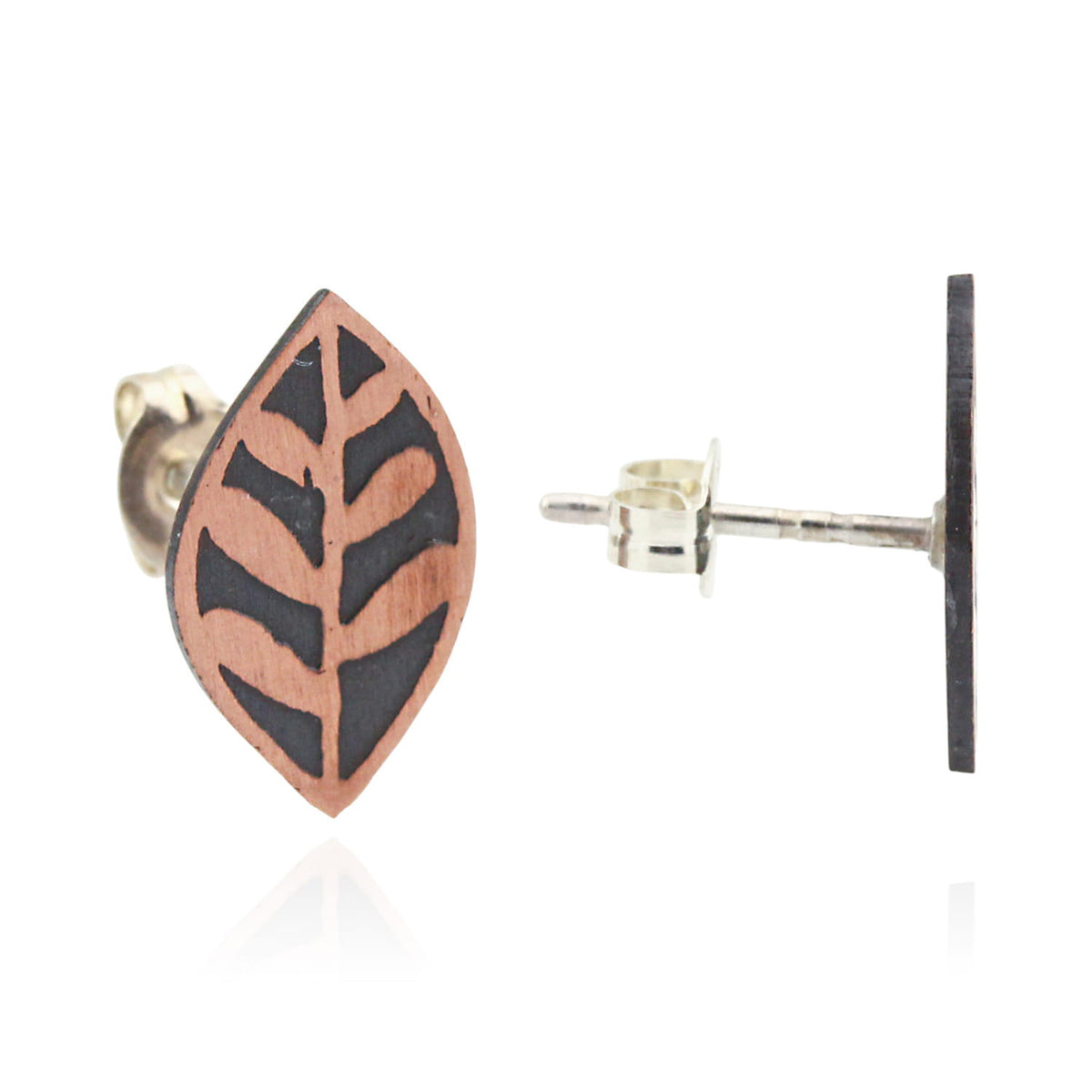 Pair of leaf-shaped earrings on a white background