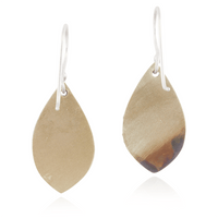 Teardrop-shaped earrings with natural brown and gold color on a white background