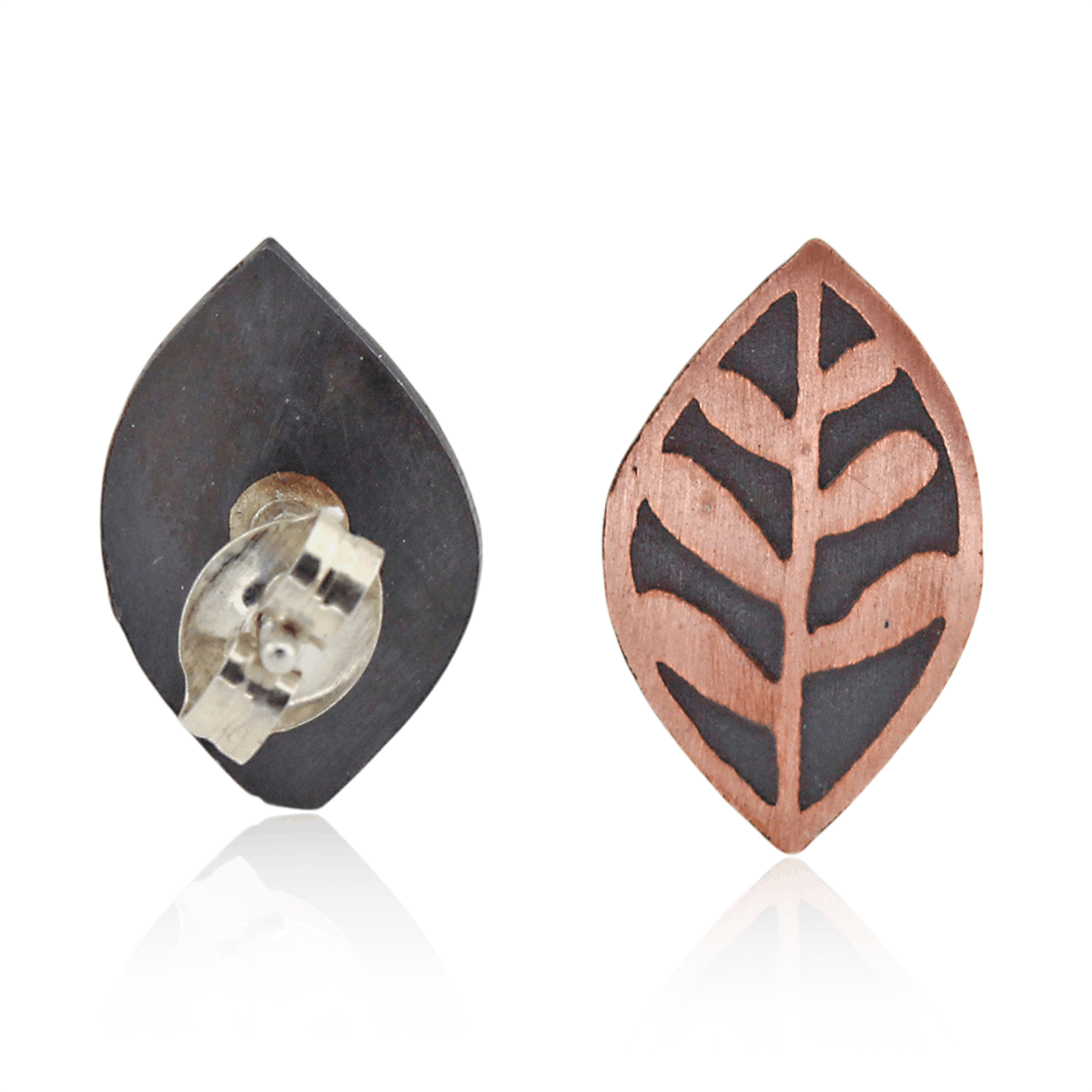 Pair of leaf-shaped earrings on a white background