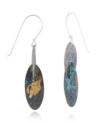 Pair of earrings with blue and gold speckled design on a white background
