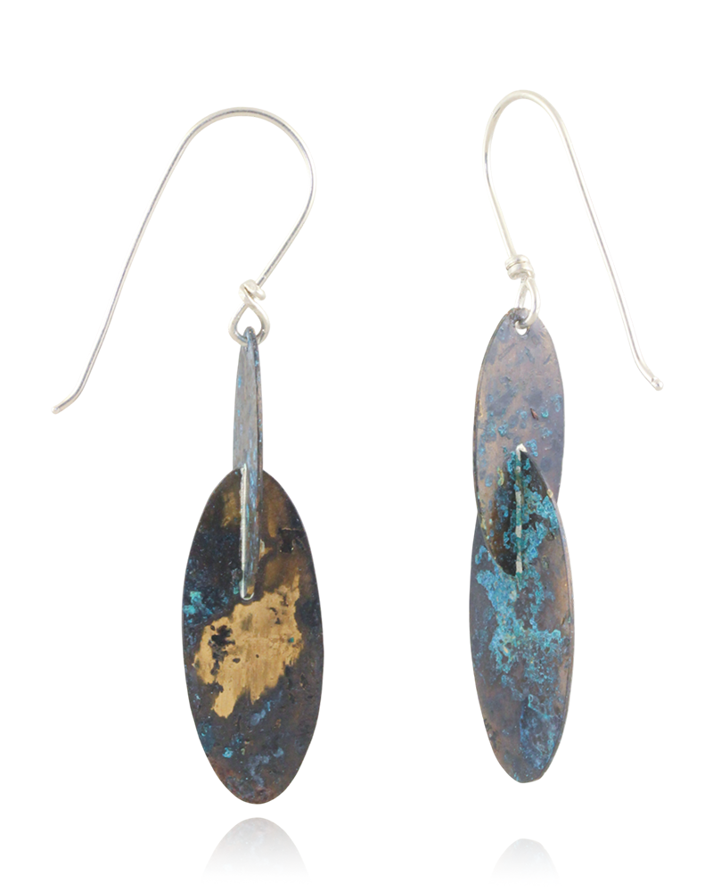 Pair of earrings with blue and gold speckled design on a white background