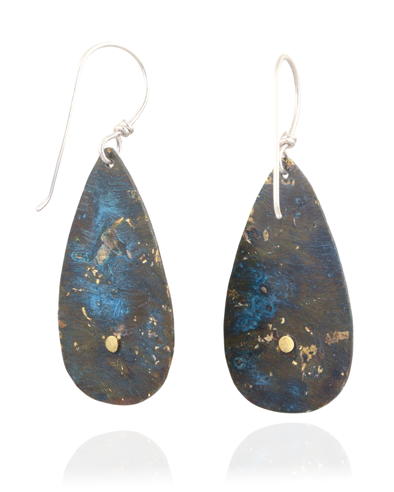 Back of colorful teardrop-shaped earrings on a white background.