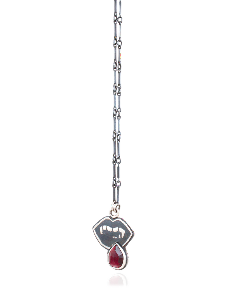 Lust: Vampire Fangs Pendant with Garnet