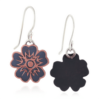 Floral-shaped earrings on a white background