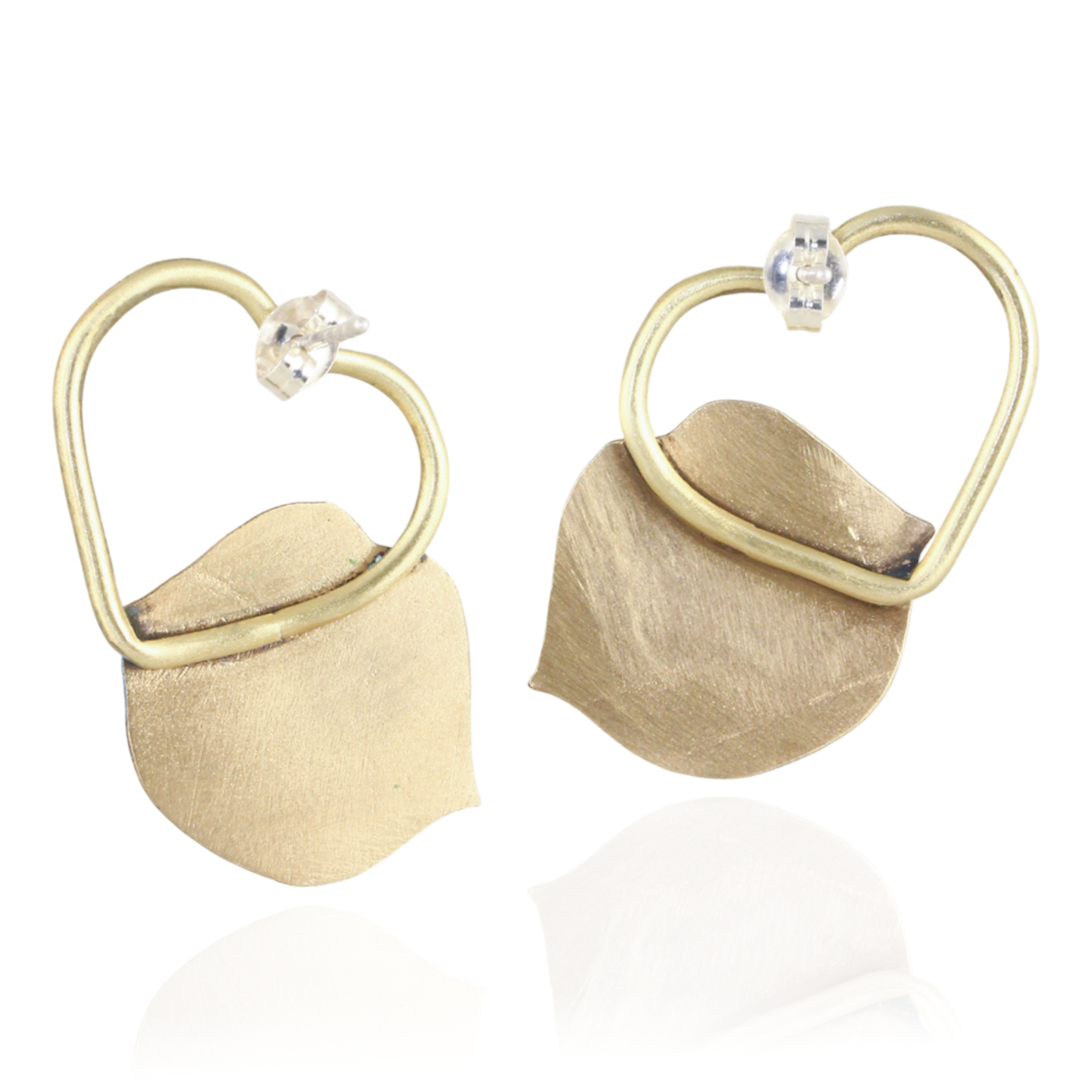 Gold earrings with heart lips-shaped  element on a white background.