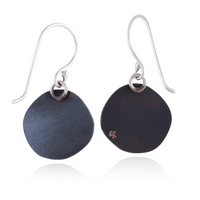 Black round earrings with silver hooks on a white background