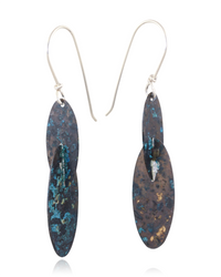 Pair of earrings with blue and gold speckled design on a white background