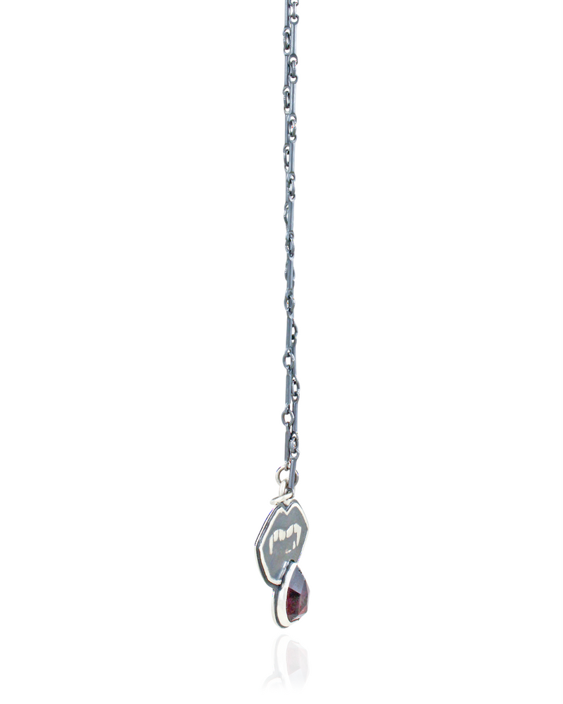 Lust: Vampire Fangs Pendant with Garnet