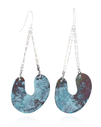 Pair of blue earrings with silver chains on a white background