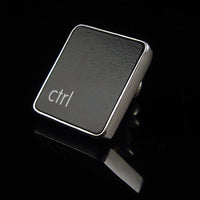 Sterling silver ctrl pin with recycled Mac keyboard key and polished finish