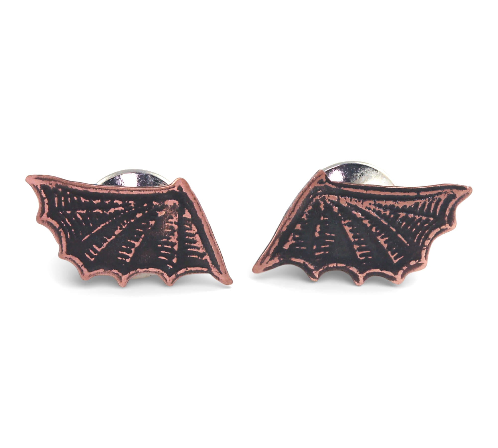 Copper Bat-shaped pin on a white background