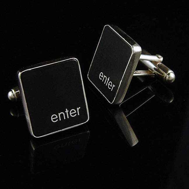 Black square cufflinks with 'enter' text on a black background