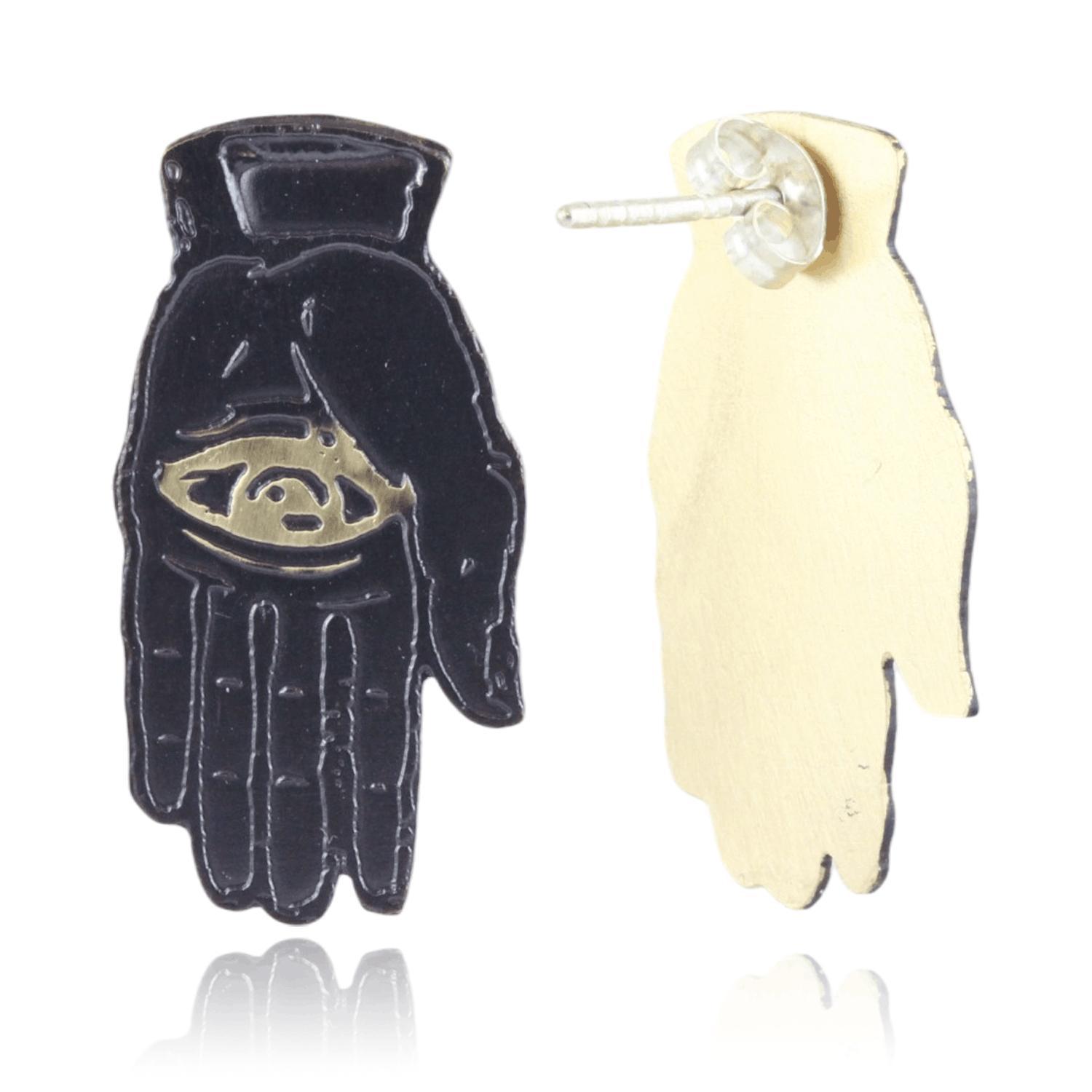 Slate colored palm with gold eye design and back of earrings on a white background.
