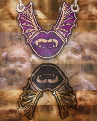 Fictional Character's wear Creative Dexterity Jewelry Memes: Nosferatu characters Clara and Louise with Creative Dexterity's Vampire Bat Fangk-U Pendants in front.