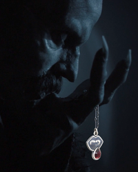 Lust: Vampire Fangs Pendant with Garnet