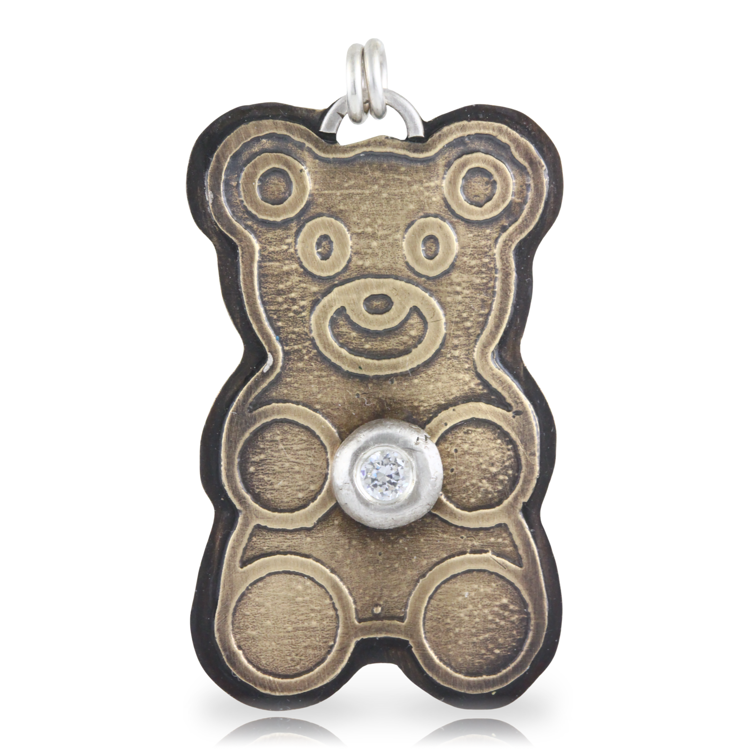 Gold teddy bear-shaped pendant with a white CZ gemstone on a white background