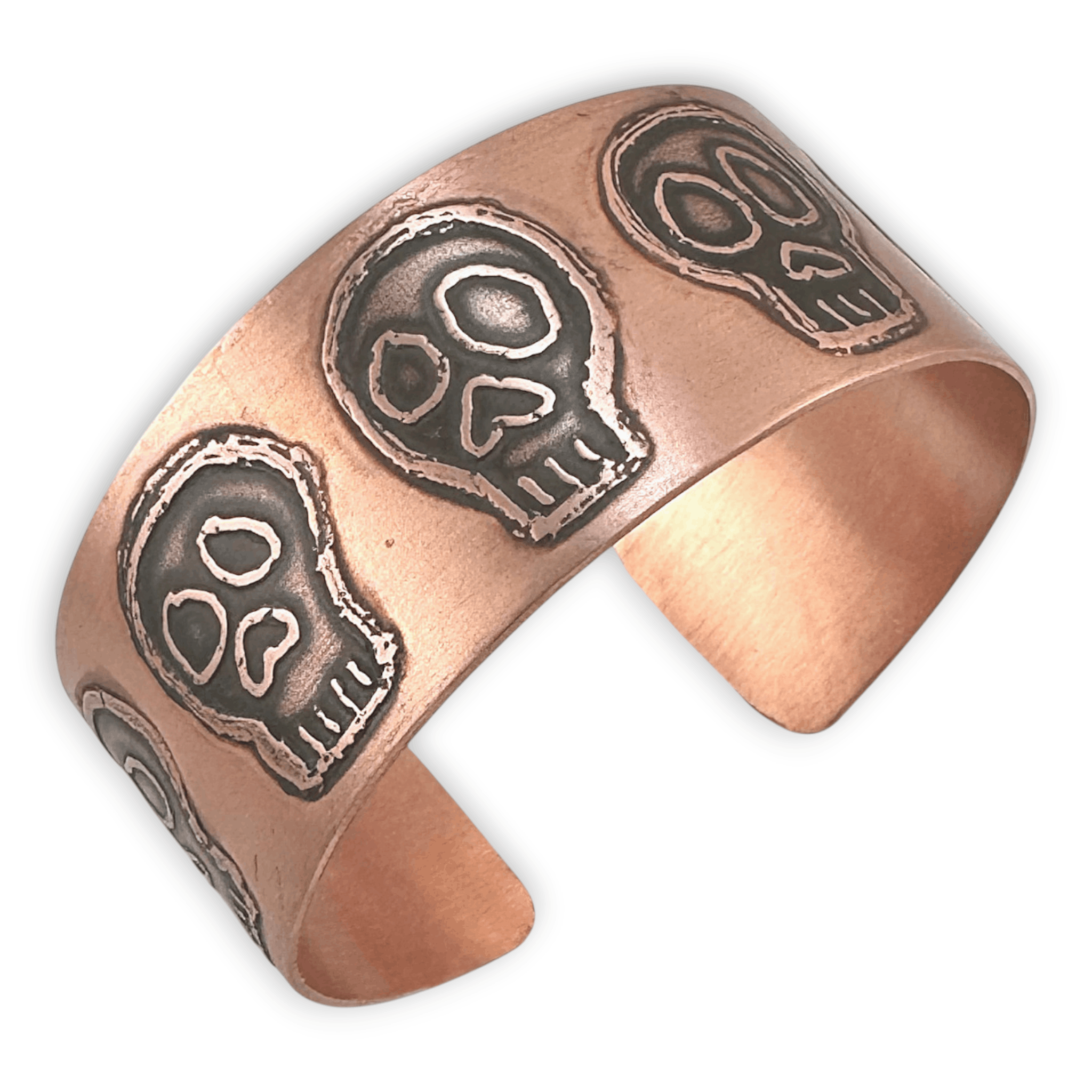 Copper bracelet with skull designs on a white background