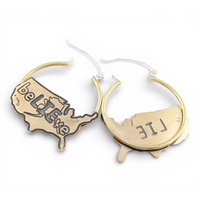 Gold and silver hoop earrings with 'beLIEve' and 'LIE' text mirrored on a white background