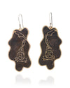 Pair of handmade and designed brass earrings with statement design on a white background. v2 Front.