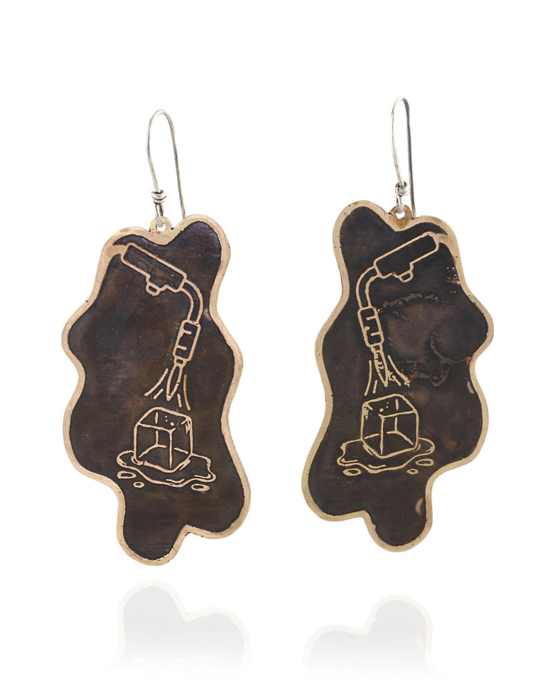 Pair of handmade and designed brass earrings with statement design on a white background. v2 Front.