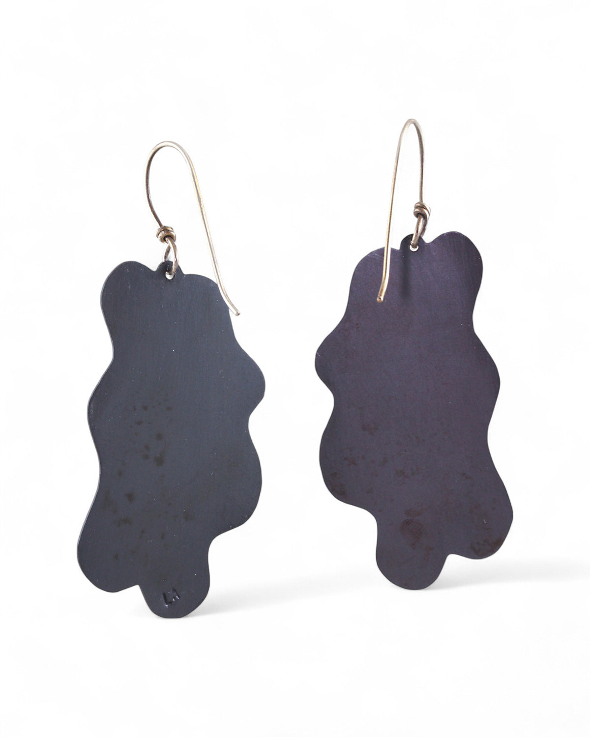 Pair of handmade and designed copper earrings on a white background. Back View. v4-small size