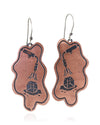 Pair of handmade and designed copper earrings on a white background. Front View. v5
