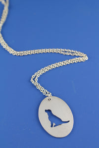 Mutt Rescue Sitting Dog Silhouette Oval Pendant