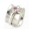 Sterling silver spinner ring with 5mm pink cubic zirconia, size 7.25 - side view