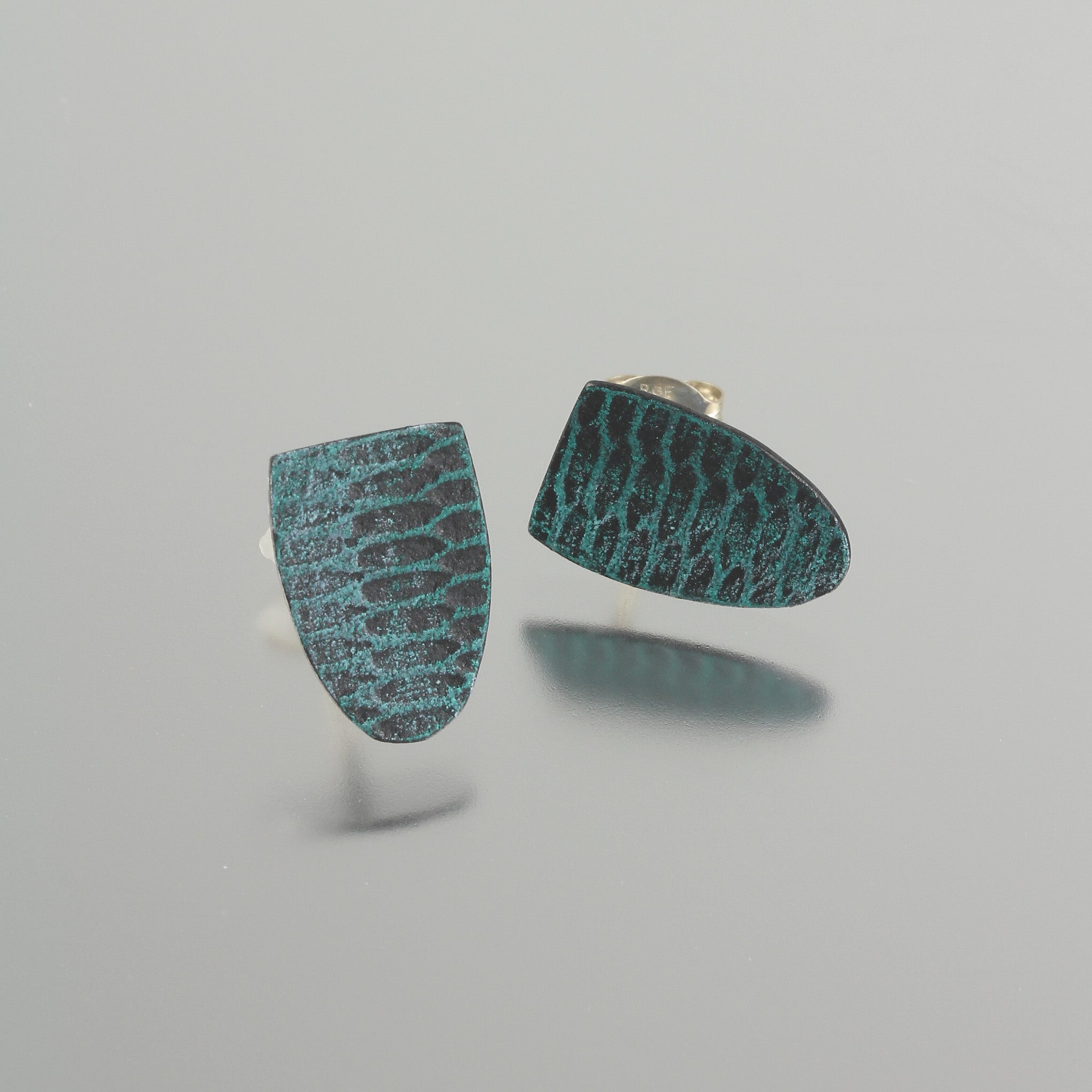 Teal Snakeskin Shield Studs Creative Dexterity: Front and Side