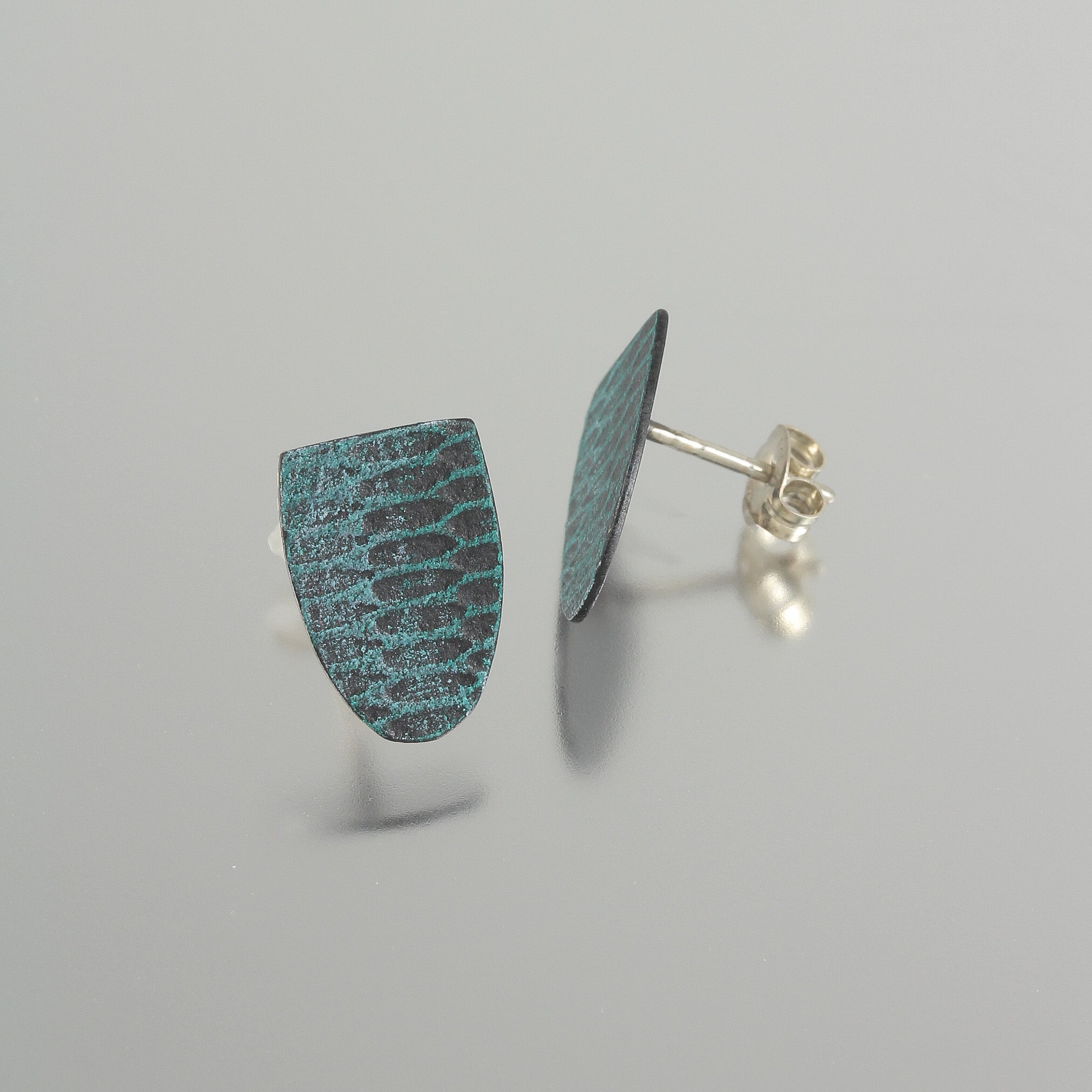 Teal Snakeskin Shield Studs Creative Dexterity: Font and Side-Back