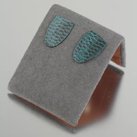 Teal Snakeskin Shield Studs Creative Dexterity: Front