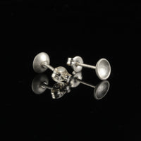 Handmade tiny domed cup sterling silver stud earrings - back and side view. 