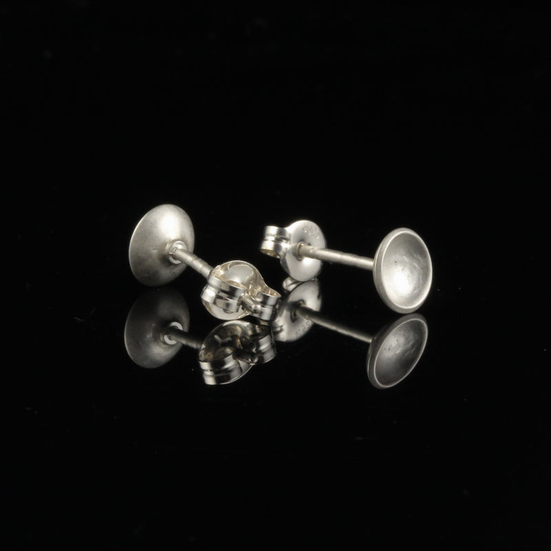 Handmade tiny domed cup sterling silver stud earrings - back and side view. 