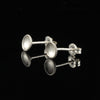 Handmade tiny domed cup sterling silver stud earrings - back and side view.