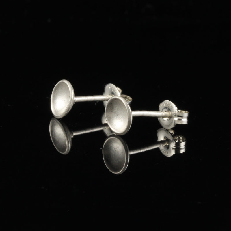 Handmade tiny domed cup sterling silver stud earrings - back and side view.