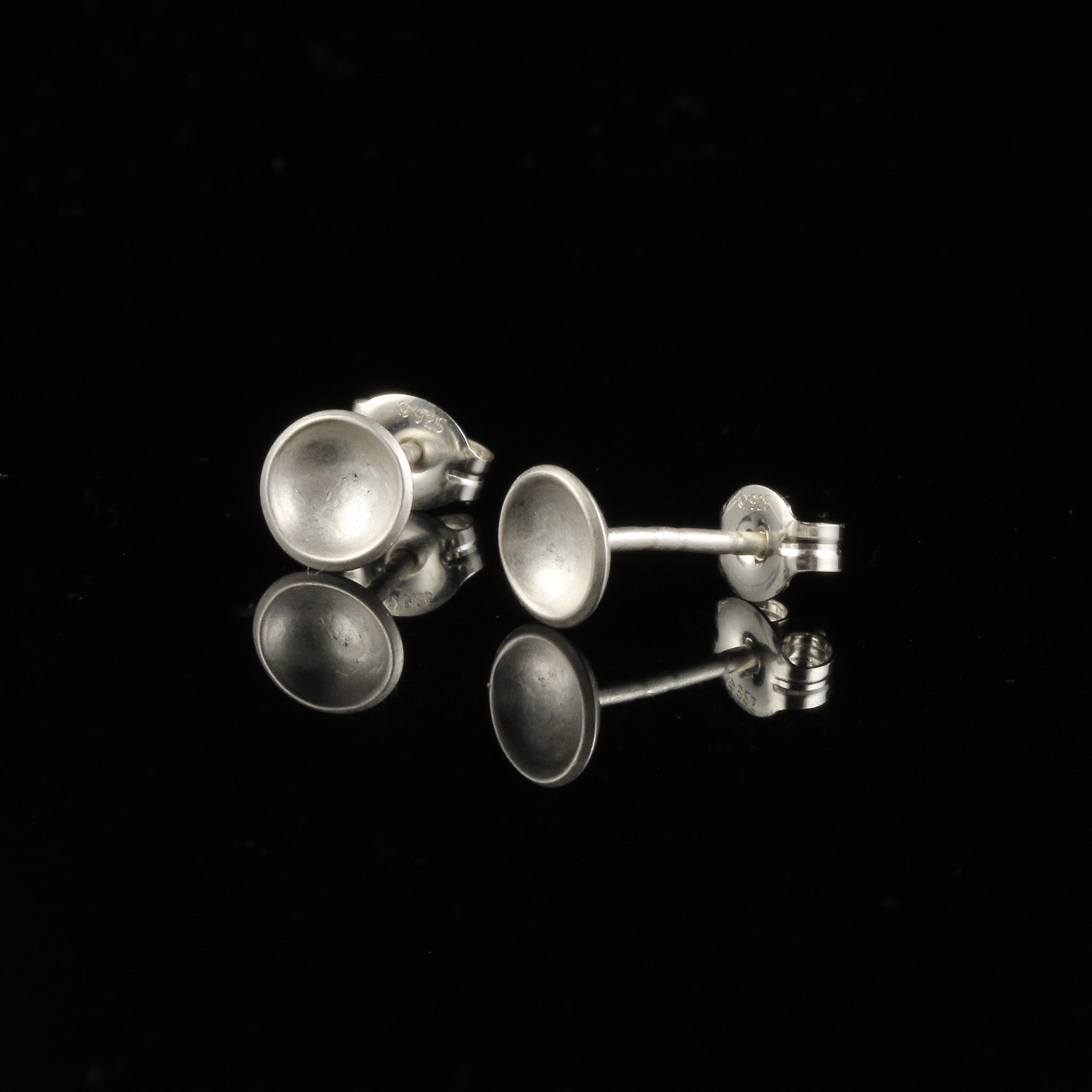 Handmade tiny domed cup sterling silver stud earrings - front and side view.